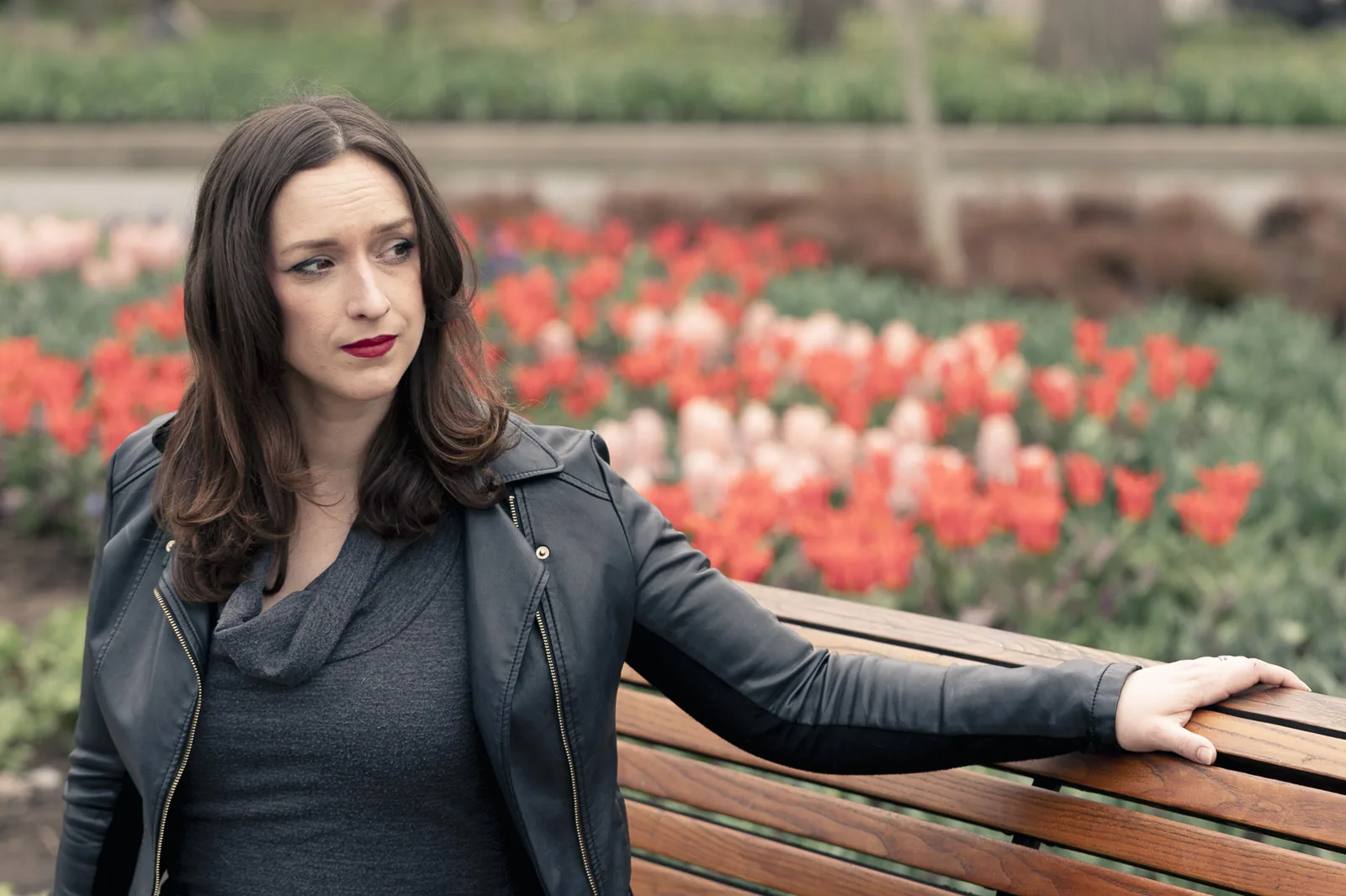Portrait at Major's Hill Park during the Ottawa Tulip Festival, red tulips in background